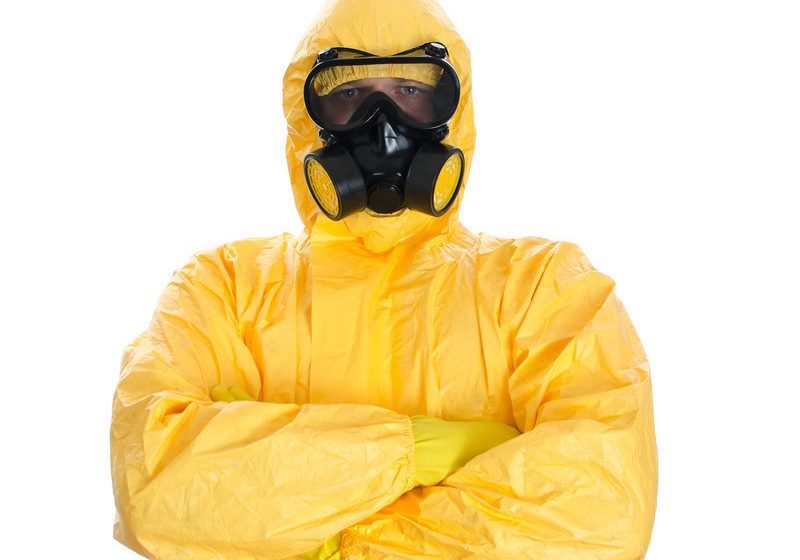 Man in protective hazmat suit. Isolated on white. Man in protective hazmat suit. Isolated on white.